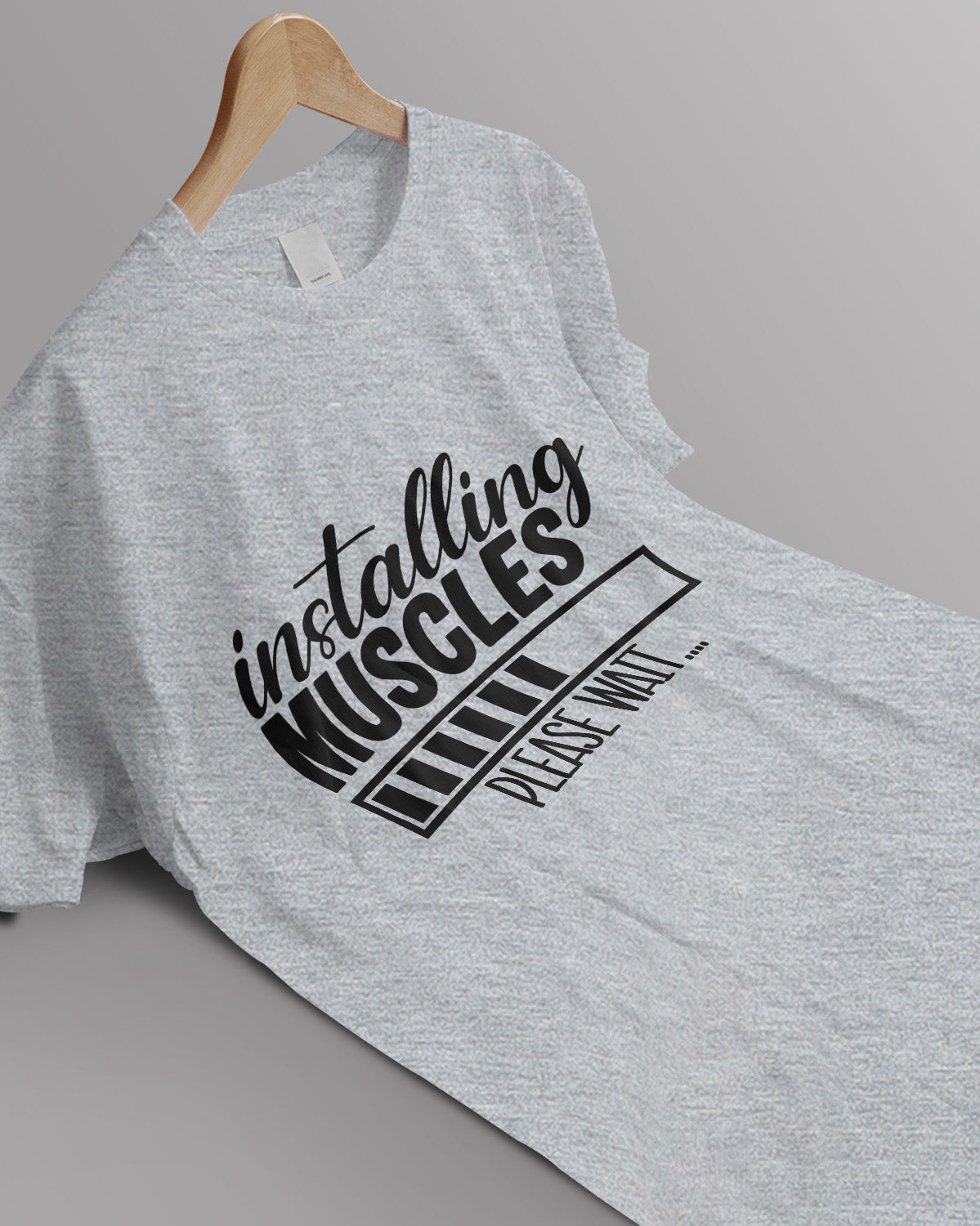Unisex Motivation Tee | Installing Muscles Please Wait..